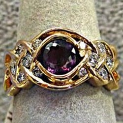 Bockemuehl Jewelers - 14K Celtic gold ring with a genuine Alexandrite and diamond accents.