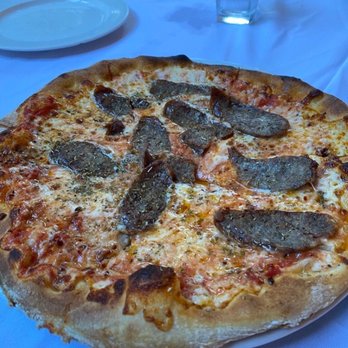 Carpaccio - Spicey sausage pizza - Italian Near Me - Bal Harbour, Florida