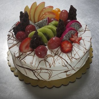 Sheng Mary Bakery - Vanilla sponge cake with pudding and mixed fruit layered fillings and fruit arrangement on top. - Bakeries Near Me - Flushing, New York Sheng Mary Bakery - Vanilla sponge cake with pudding and mixed fruit layered fillings and fruit arrangement on top. - Bakeries Near Me - Flushing, New York