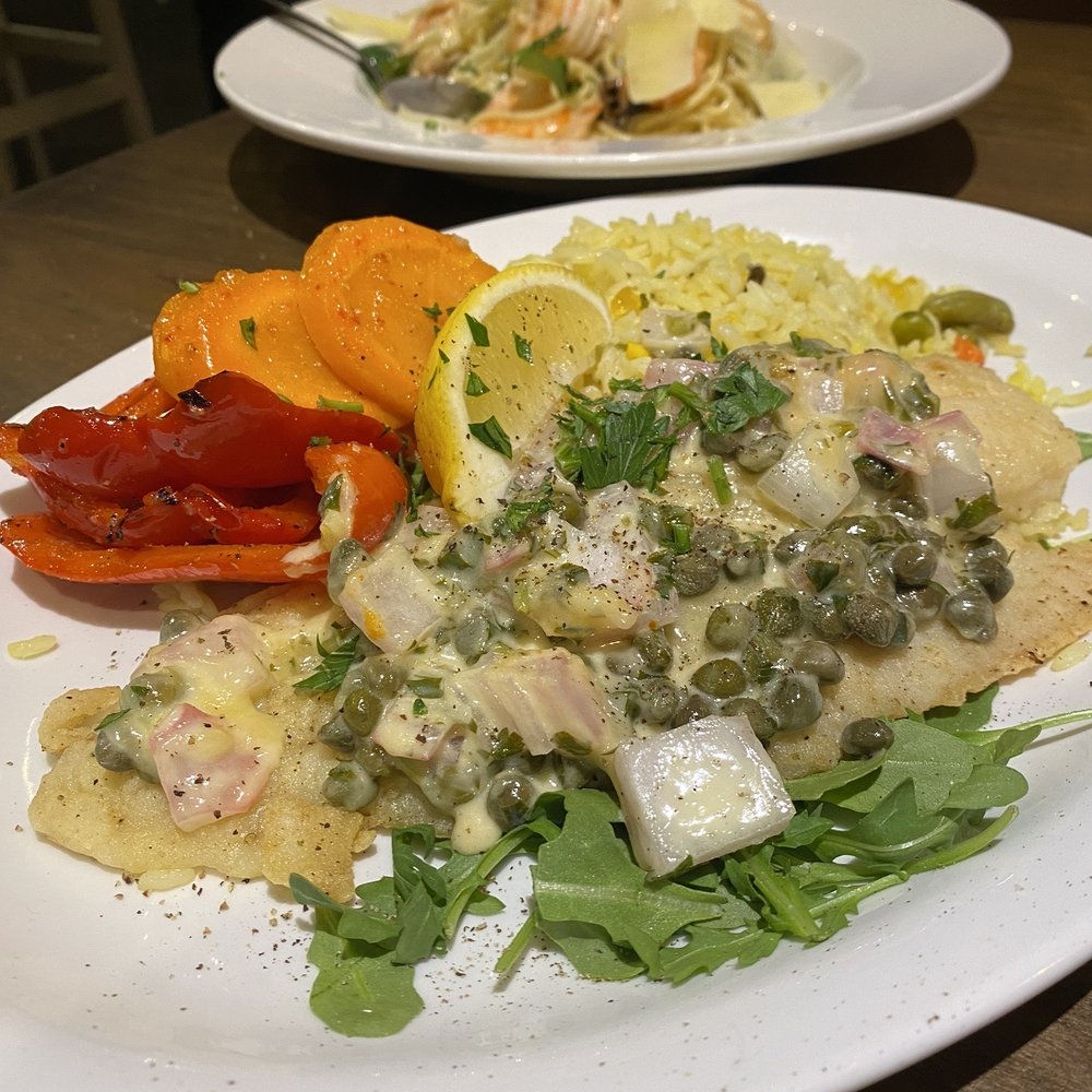 Mythos - Mythos - Seabass, seared fillet entrée topped by capers, creamy lemon sauce - Greek Near Me - Burlington, Ontario