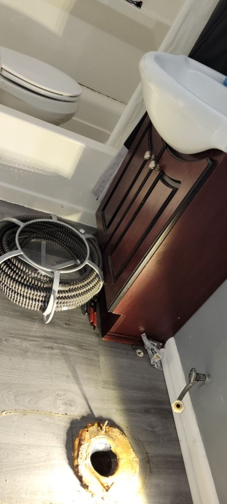 Slide of ED's Drain Cleaning