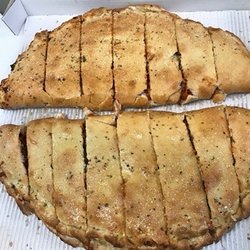 Vesuvio Pizza - Calzone meat combo & pepperoni mushroom.