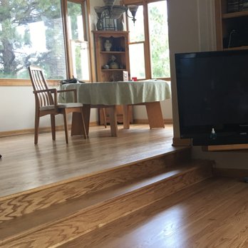 Affordable Flooring & Remodeling - Refinished wood floor upper level. New and well matched flooring in the lower level.  Beautiful job. - Flooring Near Me - Aurora, Colorado