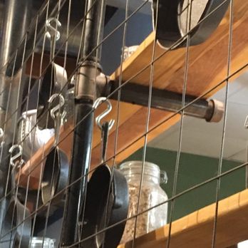 First Watch Matthews - The kitchen has this screen with the pots n pans hanging loved the home feel - Breakfast & Brunch Near Me - Matthews, North Carolina