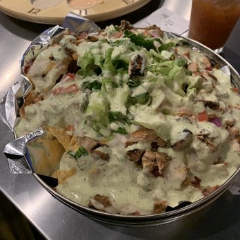 Twisted Ranch - Chicken pesto nachos - Bars Near Me - St. Louis, Missouri Twisted Ranch - Chicken pesto nachos - Bars Near Me - St. Louis, Missouri
