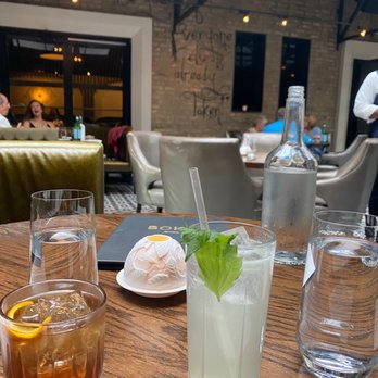 Boka - Indoor/outdoor Greenhouse Terrace . Cross Czech cocktail on the left, Groovy Baby cocktail on the right. - New American Near Me - Chicago, Illinois Boka - Indoor/outdoor Greenhouse Terrace . Cross Czech cocktail on the left, Groovy Baby cocktail on the right. - New American Near Me - Chicago, Illinois