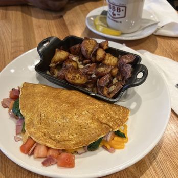 Big Bad Breakfast - Lodge - Cornbread omelet with skillet potatoes - Breakfast & Brunch Near Me - South Pittsburg, Tennessee Big Bad Breakfast - Lodge - Cornbread omelet with skillet potatoes - Breakfast & Brunch Near Me - South Pittsburg, Tennessee