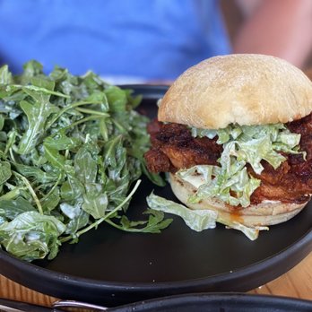Oak Wood Fire Kitchen - Nashville sandwich & added arugula salad. - Pizza Near Me - Draper, Utah Oak Wood Fire Kitchen - Nashville sandwich & added arugula salad. - Pizza Near Me - Draper, Utah