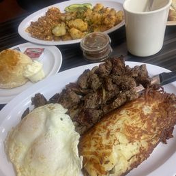 Marinated steak and eggs , chorizo con huevo with home fries