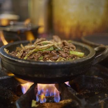 Tang 190 - A little sesame oil and red hot sauce placed sizzling around the edges. Perfection. - Korean Near Me - Irvine, California Tang 190 - A little sesame oil and red hot sauce placed sizzling around the edges. Perfection. - Korean Near Me - Irvine, California