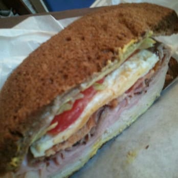 M&M Deli - Half of a "Genie" sandwich. Created by the owners daughter. Has turkey, ham, roast beef & fried egg on squaw bread. - Delis Near Me - Riverside, California M&M Deli - Half of a "Genie" sandwich. Created by the owners daughter. Has turkey, ham, roast beef & fried egg on squaw bread. - Delis Near Me - Riverside, California
