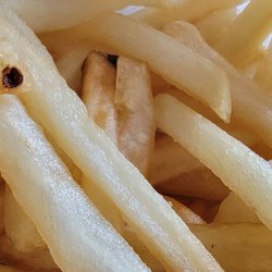 Tino's Carry Out - Not a fan, sorry Tommy. I prefer krinkle cut fries that are golden on the outside and tender on the inside.