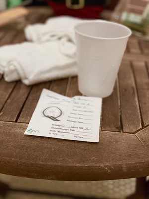 Photo of Quapaw Baths & Spa - Hot Springs, AR, US. Private couples bath sitting space after. Water and cold towels provided.