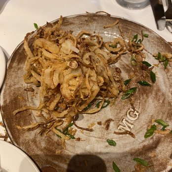 Mustards Grill - The end of the delicious onion rings. - New American Near Me - Napa, California Mustards Grill - The end of the delicious onion rings. - New American Near Me - Napa, California