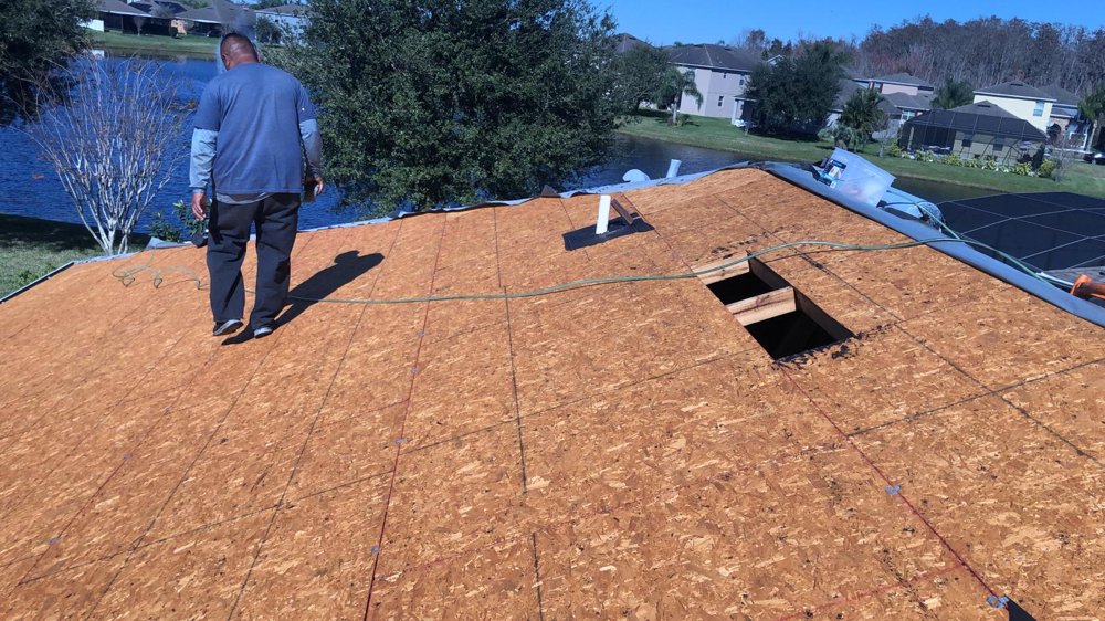 Slide of A2M Roofing