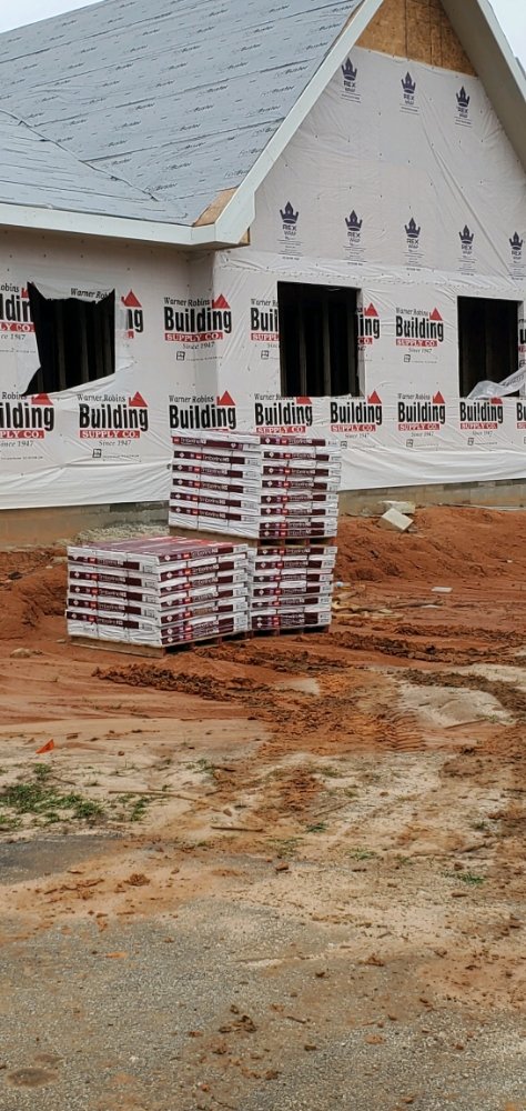 Slide of Longhorns Roofing