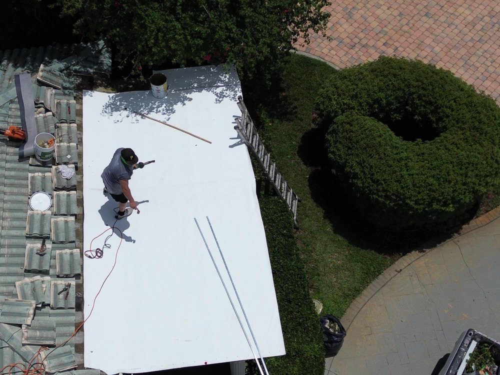 Slide of Janus Roofing