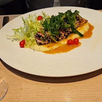 The Bistro Edgewood - A fish dish on a bed of polenta. My dining partner's choice - New American Near Me - Stateline, Nevada