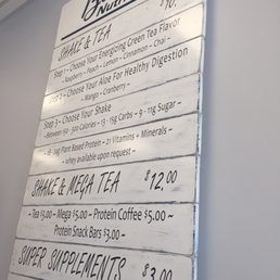 a menu on a wall a menu on a wall