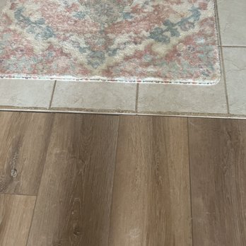 Dave’s Construction Design - Unfinished transition strips not done leaving gap between the floorings - General Contractors Near Me Dave’s Construction Design - Unfinished transition strips not done leaving gap between the floorings - General Contractors Near Me