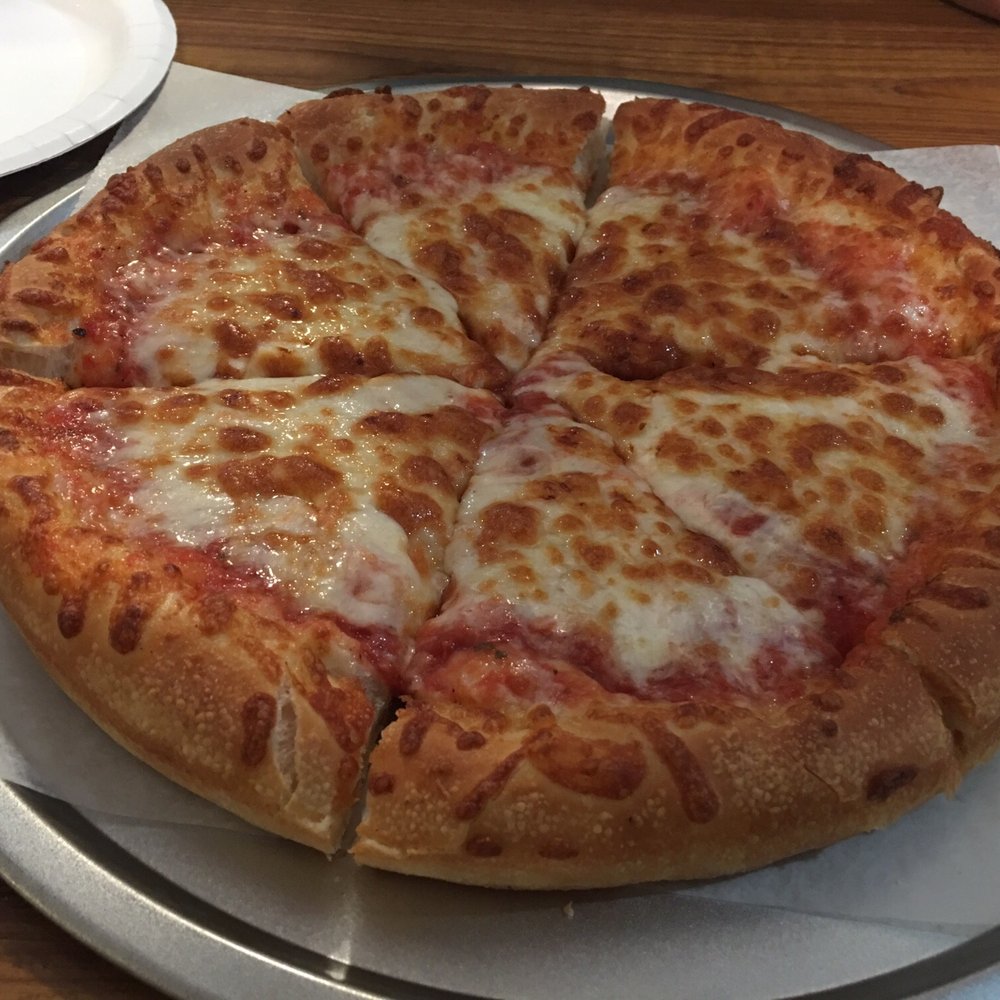 a cheese pizza on a plate