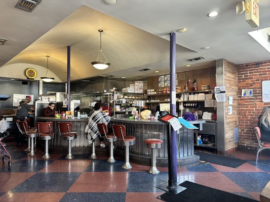 Photo of Thumbs Up Diner - Atlanta, GA, US. people sitting at the counter