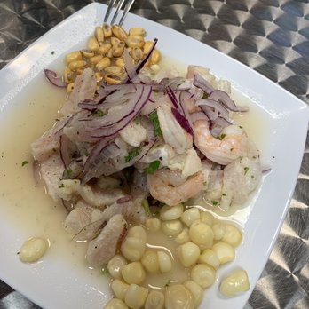 Latino’s Joint - a plate of food on a table - Latin American Near Me - Cape Coral, Florida Latino’s Joint - a plate of food on a table - Latin American Near Me - Cape Coral, Florida