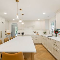 Reilex Construction - Kirkland Kitchen Remodel including:
-new backsplash
-new lighting
-new appliances, cabinets, counters
-new floors & more