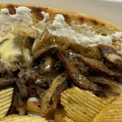 Vibrations Vegan Wellness Cafe - Elevated mushroom philly and chips.