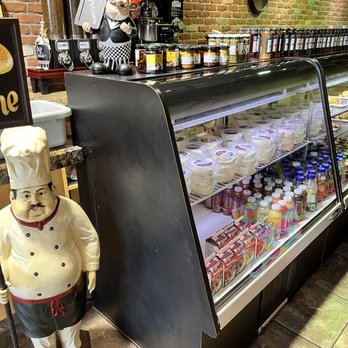 Premier Bagel - a display case with a chef figurine - Bagels Near Me - Kirkland, Quebec Premier Bagel - a display case with a chef figurine - Bagels Near Me - Kirkland, Quebec