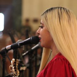 Blessed Sacrament - A worship leader sings during mass.