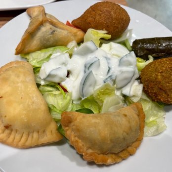 Sindbad Kebab & Grillhaus - Hot Appetizer Plate: sambousak (spinach, cheese, meat), kibbeh, dolma, falafel - Fast Food Near Me - Munich, BY