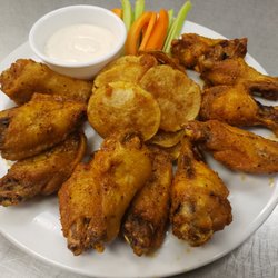 Blazing Buckets - 12pc cajun dry rub wings with blazing crispy scalloped potatoes, celery, and carrots.