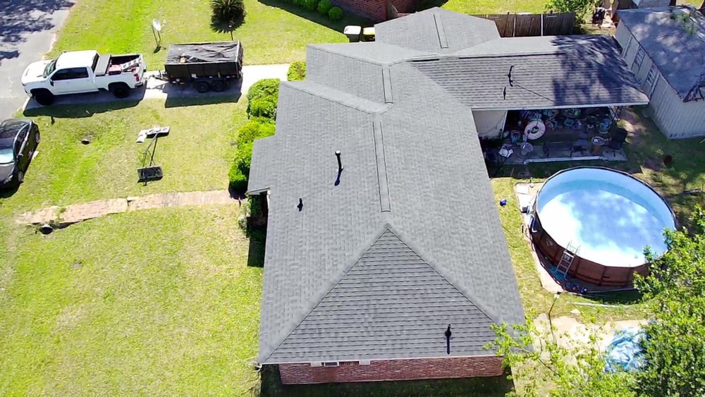 Slide of Palma's Roofing Experts