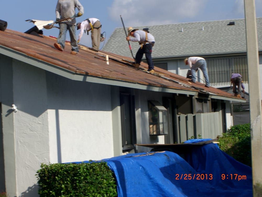 Slide of Heron Bay Roofing