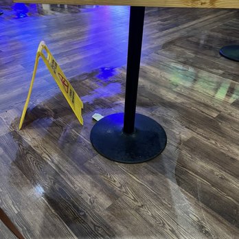 Gator's Dockside of Gainesville - Mopped floor of the table behind us - American Near Me - Gainesville, Florida Gator's Dockside of Gainesville - Mopped floor of the table behind us - American Near Me - Gainesville, Florida