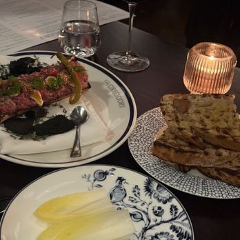 The Greggory - wagyu beef tartare with fresh roasted bread and endives - Cocktail Bars Near Me - South Barrington, Illinois