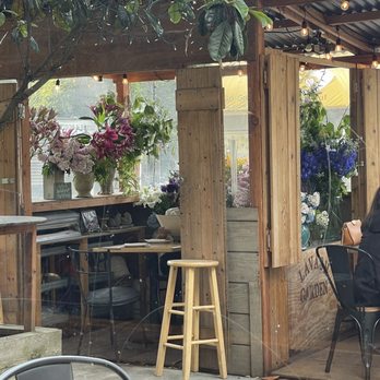 Lavash - There is an outdoor table surrounding by flowers - Persian/Iranian Near Me - San Francisco, California Lavash - There is an outdoor table surrounding by flowers - Persian/Iranian Near Me - San Francisco, California