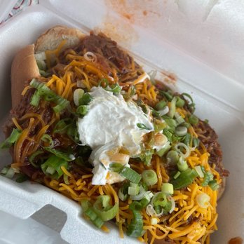Waller County Line BBQ - Walker Dog -- loaded with chopped beef, cheese, sour cream & chives - Barbeque Near Me - Waller, Texas