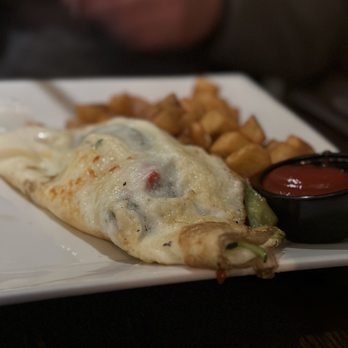 Prato 850 - an omelet with a side of fries - Gastropubs Near Me - Commack, New York Prato 850 - an omelet with a side of fries - Gastropubs Near Me - Commack, New York