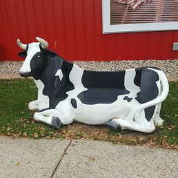 Come sit on the cow bench. Come sit on the cow bench.