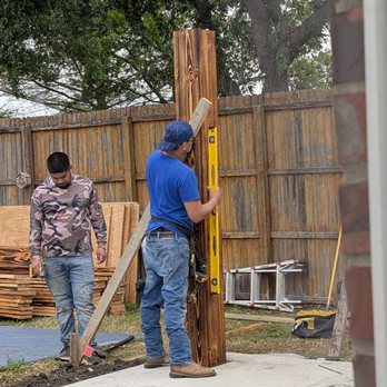 Patios By Design - Carefully measuring and setting of beams in precise location - Patio Coverings Near Me - Fort Worth, Texas