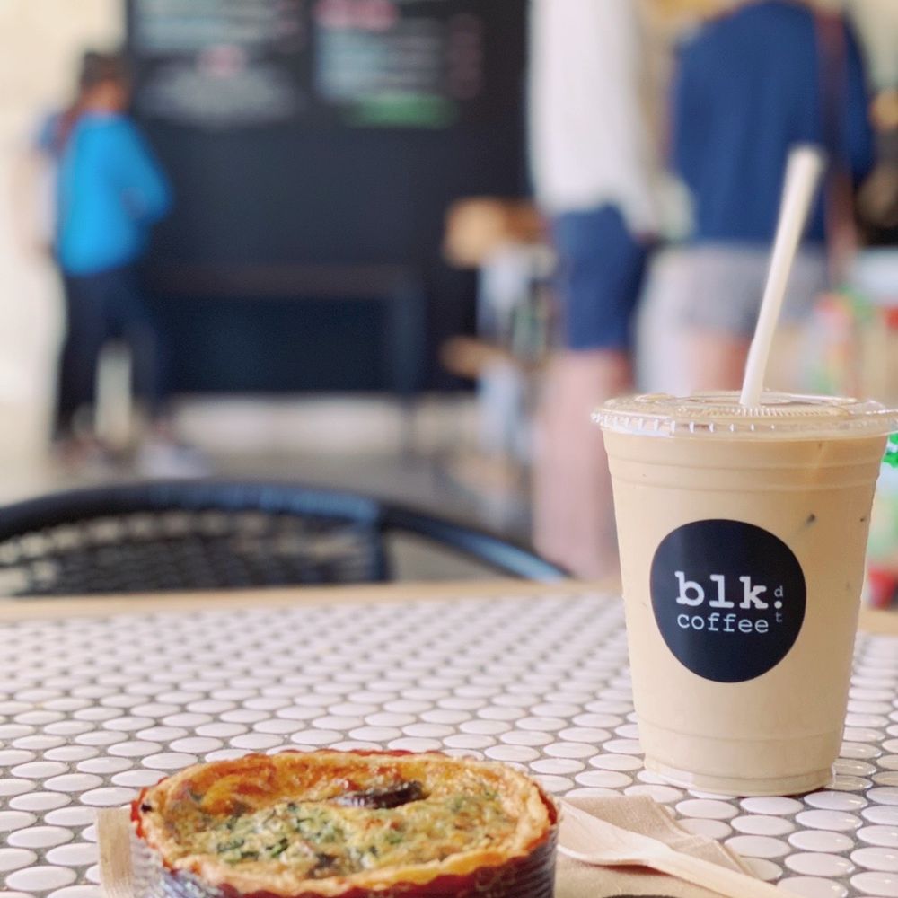 Blk Dot Coffee - a cup of coffee and a pie on a table - Coffee & Tea Near Me - Laguna Beach, California Blk Dot Coffee - a cup of coffee and a pie on a table - Coffee & Tea Near Me - Laguna Beach, California