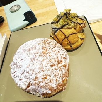 Liliha Bakery - Haupia malasada and Dubai Chocolate cream puff. - Bakeries Near Me - Honolulu, Hawaii Liliha Bakery - Haupia malasada and Dubai Chocolate cream puff. - Bakeries Near Me - Honolulu, Hawaii