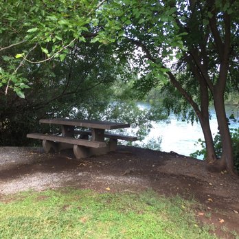 Anderson River Park - A shady bench for a meal or a cup of coffee beside the Sacramento River. - Parks Near Me - Anderson, California Anderson River Park - A shady bench for a meal or a cup of coffee beside the Sacramento River. - Parks Near Me - Anderson, California