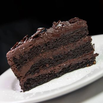 Cara Mia - a slice of chocolate cake on a plate - Italian Near Me - Millburn, New Jersey