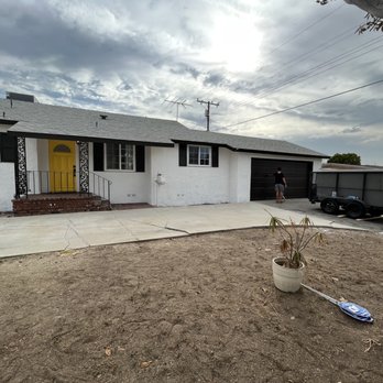 Avelar Remodeling - The front door was sanded and painted yellow - Flooring Near Me Avelar Remodeling - The front door was sanded and painted yellow - Flooring Near Me