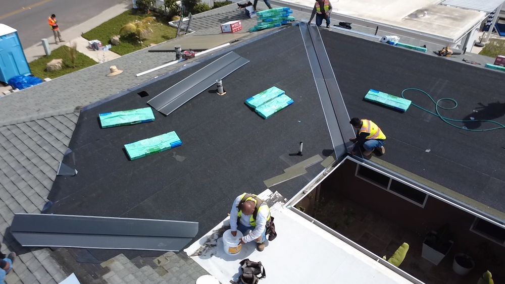 Slide of Vigil's Roofing