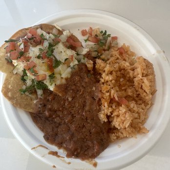 Los Tacos Lokos - Huevos Rancheros, were horrible rivers of grease in the beans, the tortilla was a tostada, the rice was dry and the sauce was on the side. - Tacos Near Me - Riverside, California