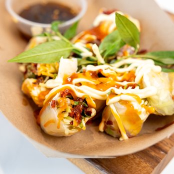 Teagether - a plate of food on a cutting board - Bubble Tea Near Me - Grand Prairie, Texas Teagether - a plate of food on a cutting board - Bubble Tea Near Me - Grand Prairie, Texas